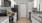 a kitchen with white cabinets