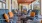 a room with chairs and tables