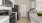 a kitchen with white cabinets